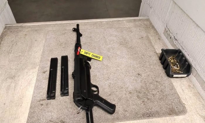 An MP40 .22 World War 2 rifle rests on the bench after firing - Taunton Deane Shooting Association